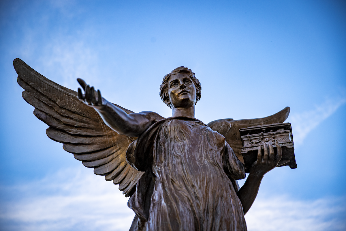 Beneficence with a bright blue sky background