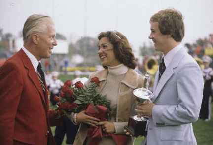 Past President  John J. Pruis and Crowns Homecoming Queen Tiann Steinhilber