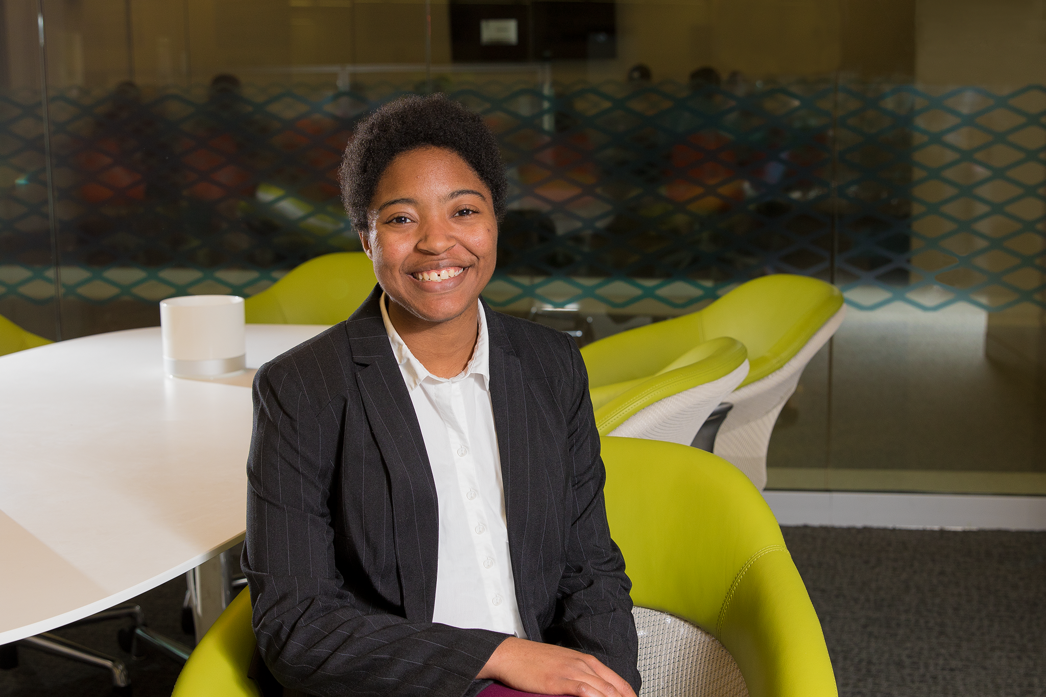 Picture of Kathy B sitting and smiling