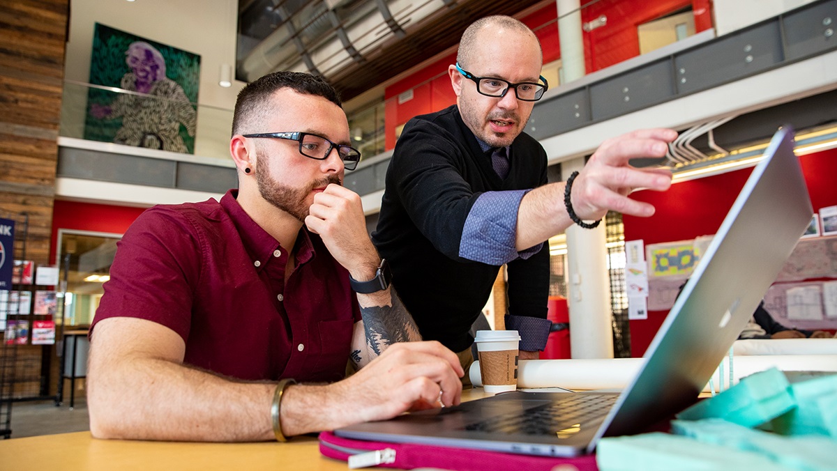 Student receives instruction behind a computer