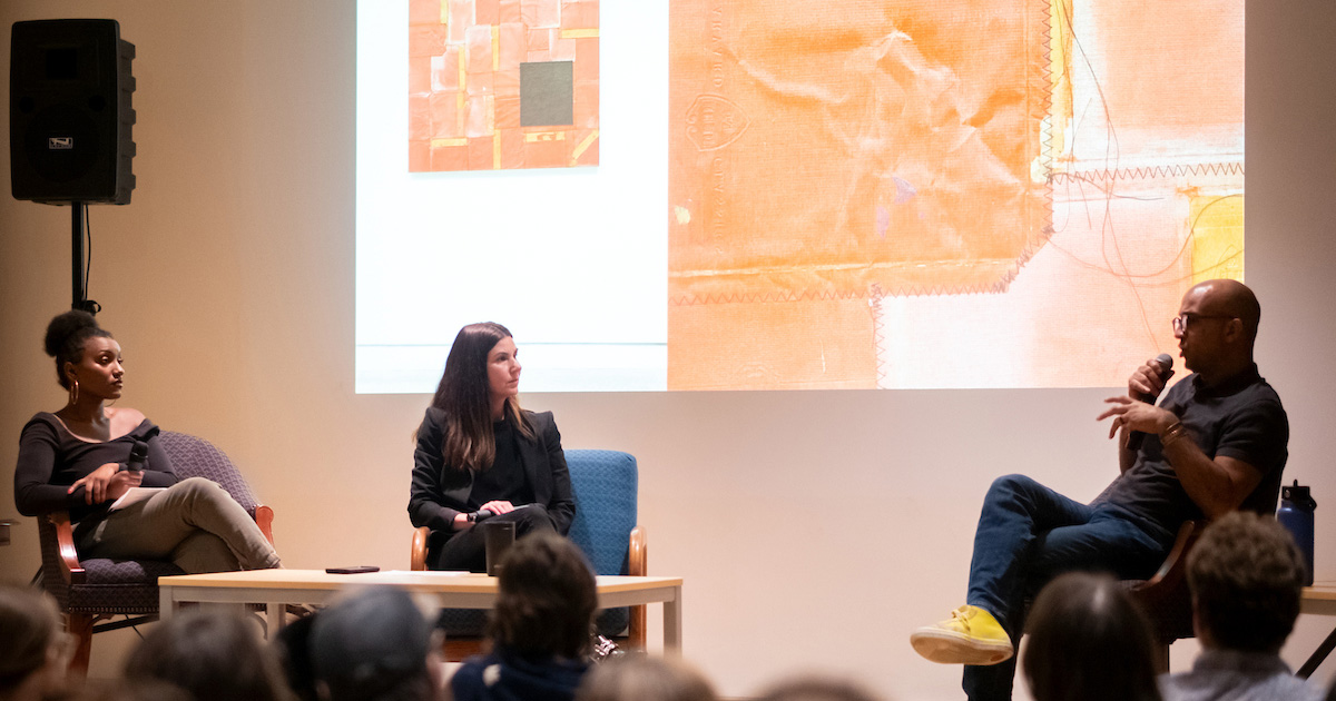 Students attend a lecture by the artist Samuel Levi Jones. 