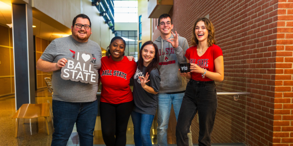 Students with Ball State signs 