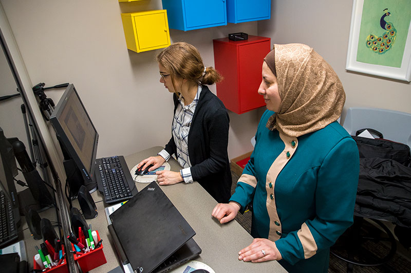 Student and Professor in HEDR Lab
