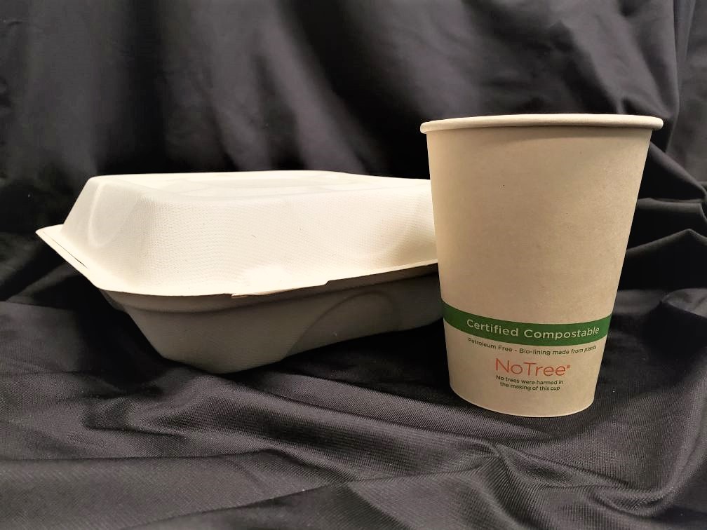 Compostable food container nicknamed a clam shell and a compostable beverage cup