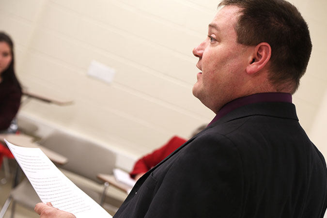 A faculty member presenting research.