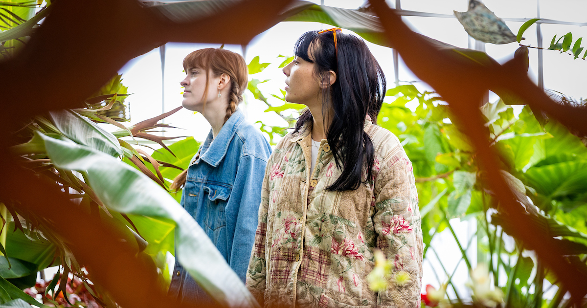 Muncie Central Students exploring and learning about different species of plants during the Christy Woods Earth Day event at Ball State