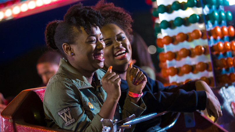 Two young women enjoy their evening.