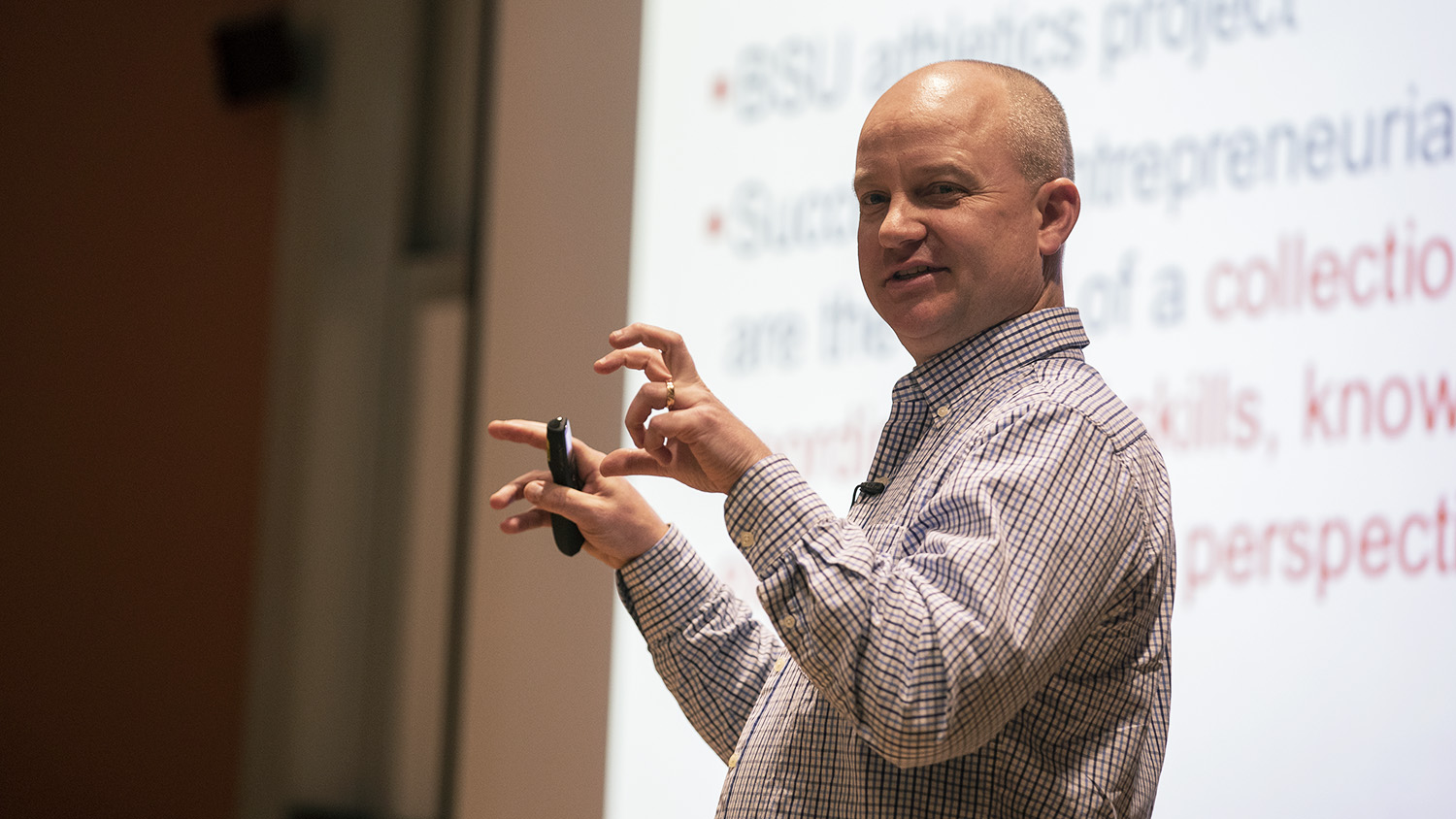 Dr. Rob Mathews speaking to an audience