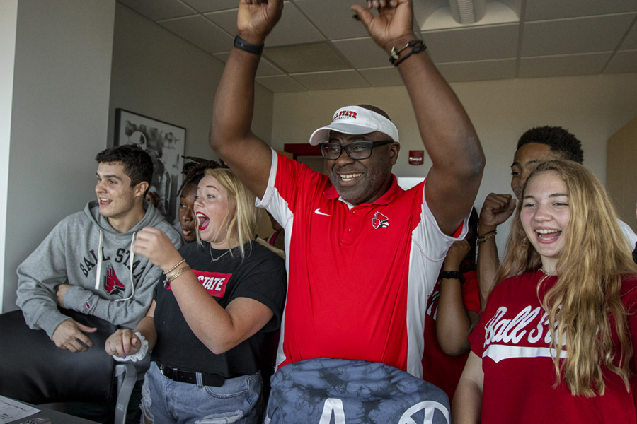 A Ball State alum hanging out with students