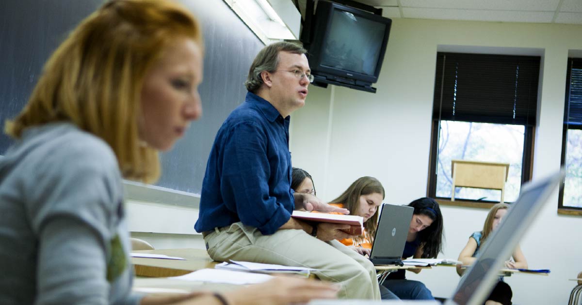 Professor addresses a classroom.