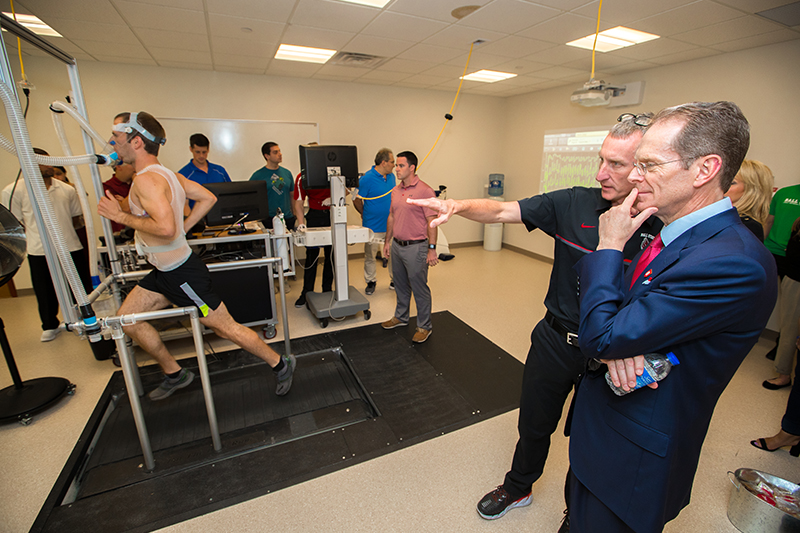 President Mearns and HPL faculty in the Human Performance Lab