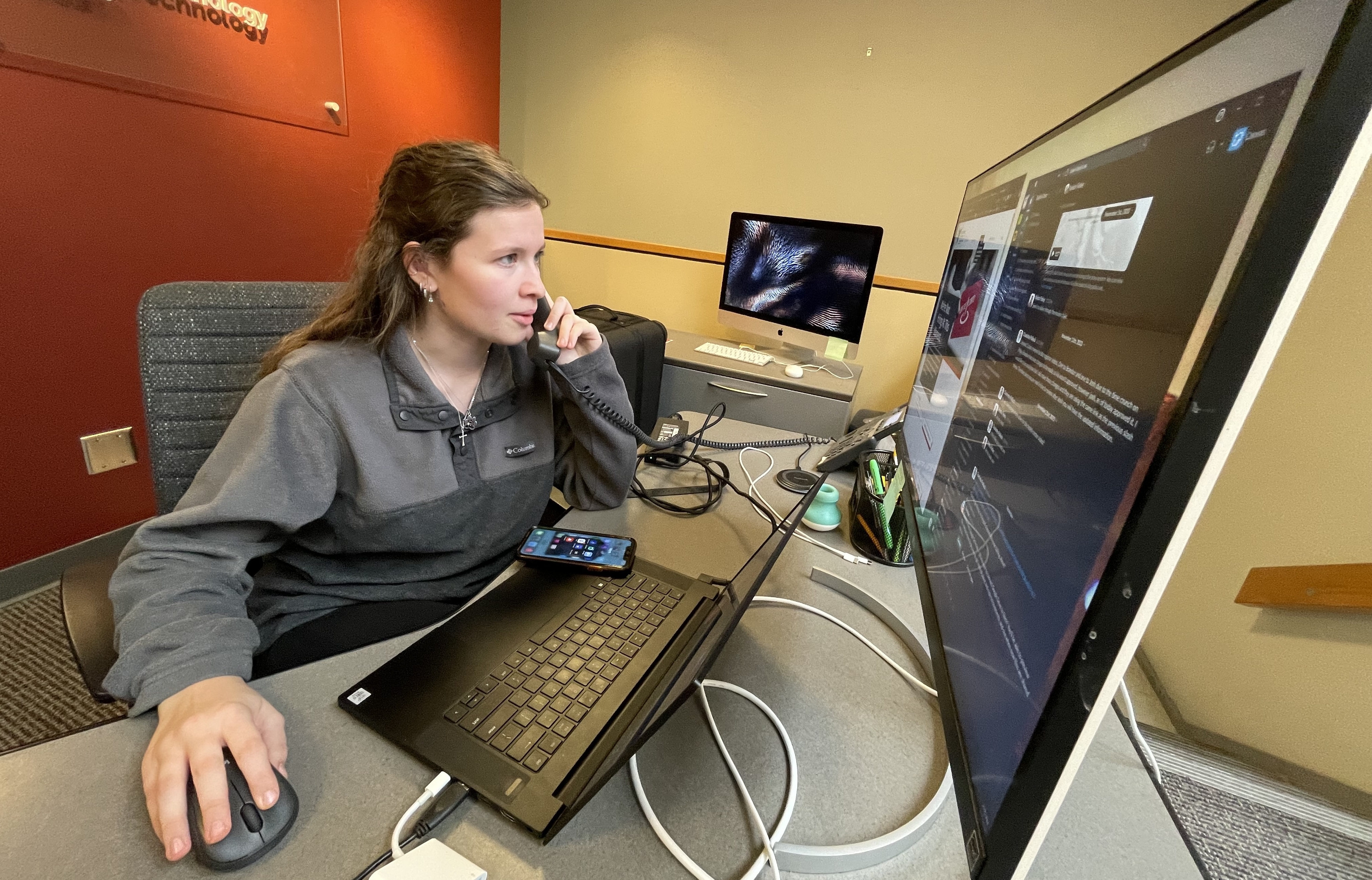 Digital Corps student on the phone