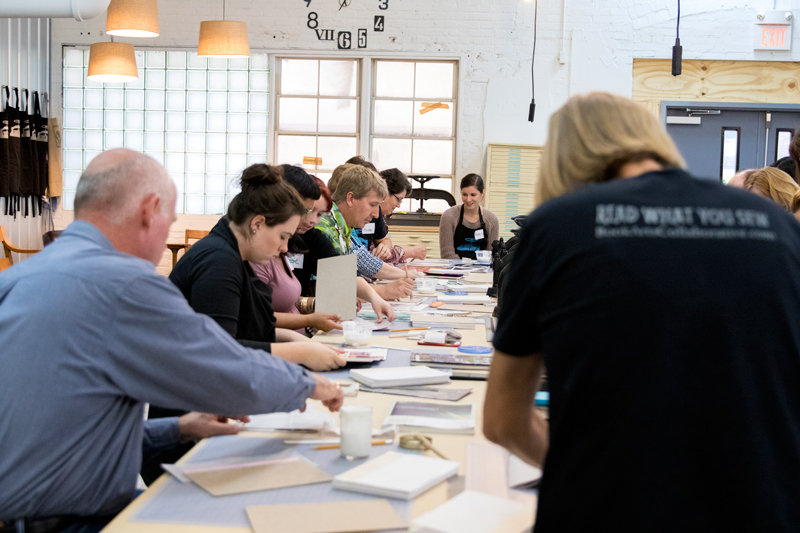 Students assemble product in an immersive learning class