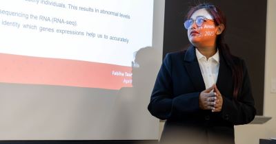 Data Mine student presenting research