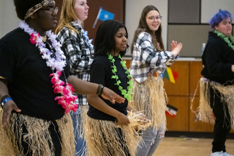 Students at Unity Week event learning a cultural dance