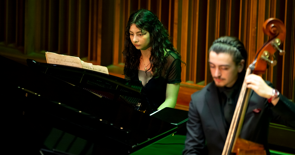 Two Ball State University students performing at a recital  