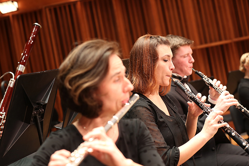 wind band symphony performing on stage