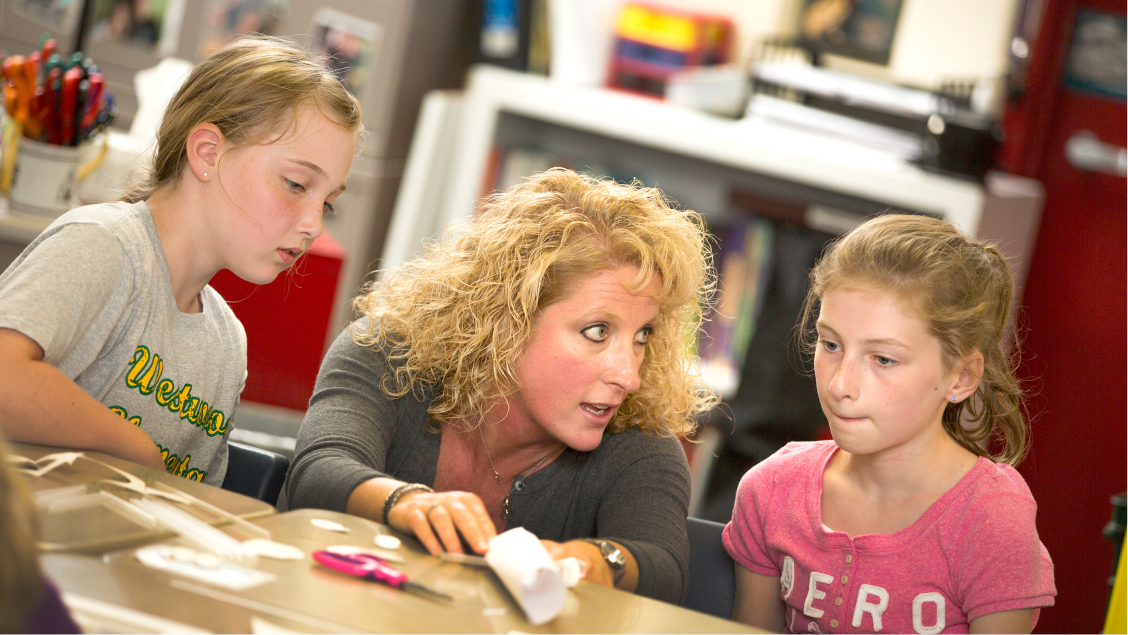 Teacher interacting with kids