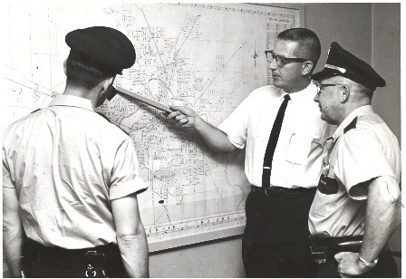 Three officers at the Ball State University Police Department in the 1960s
