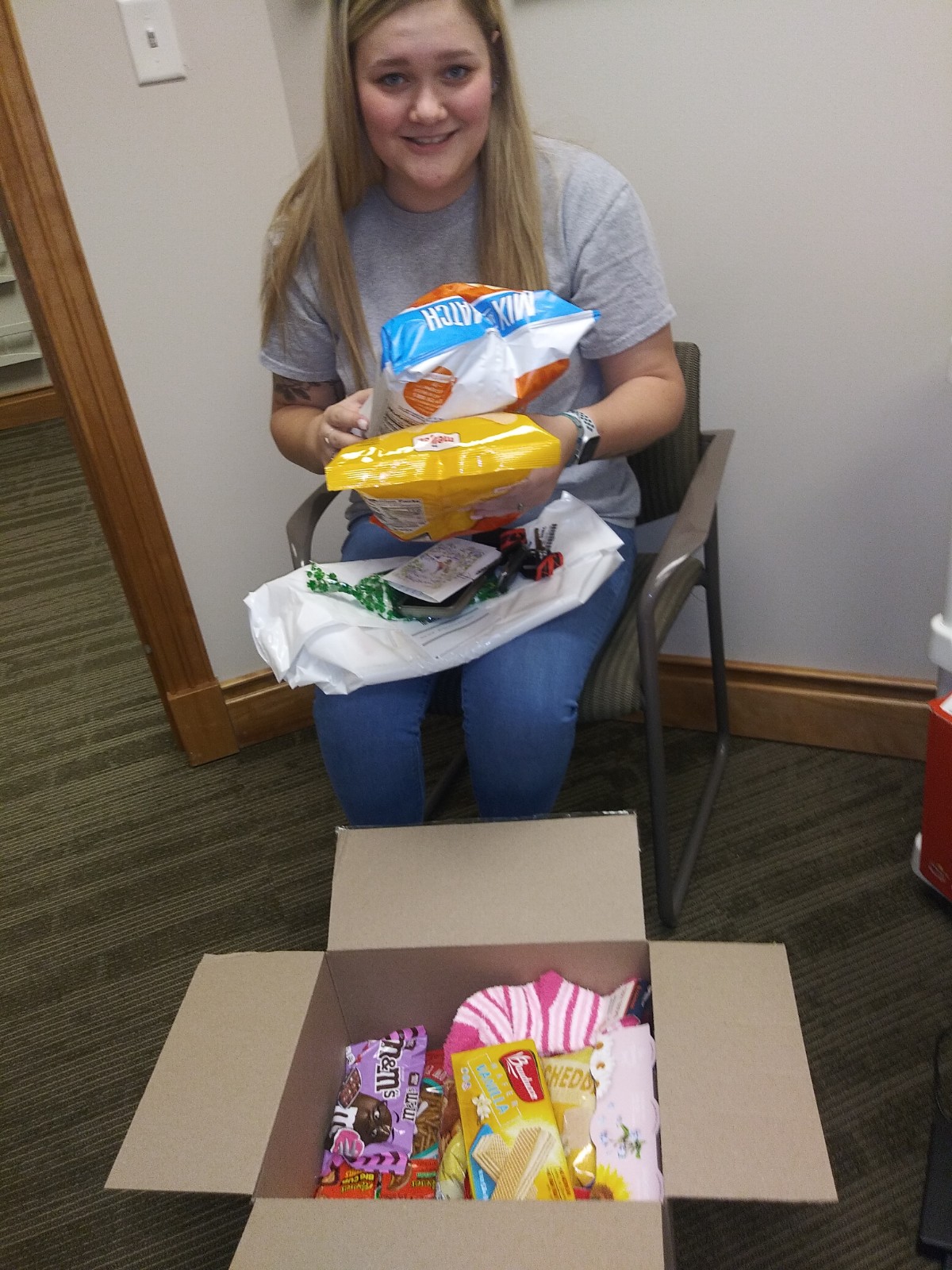 Student Opens a Care Package