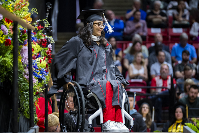 Student in wheelchair at graduation