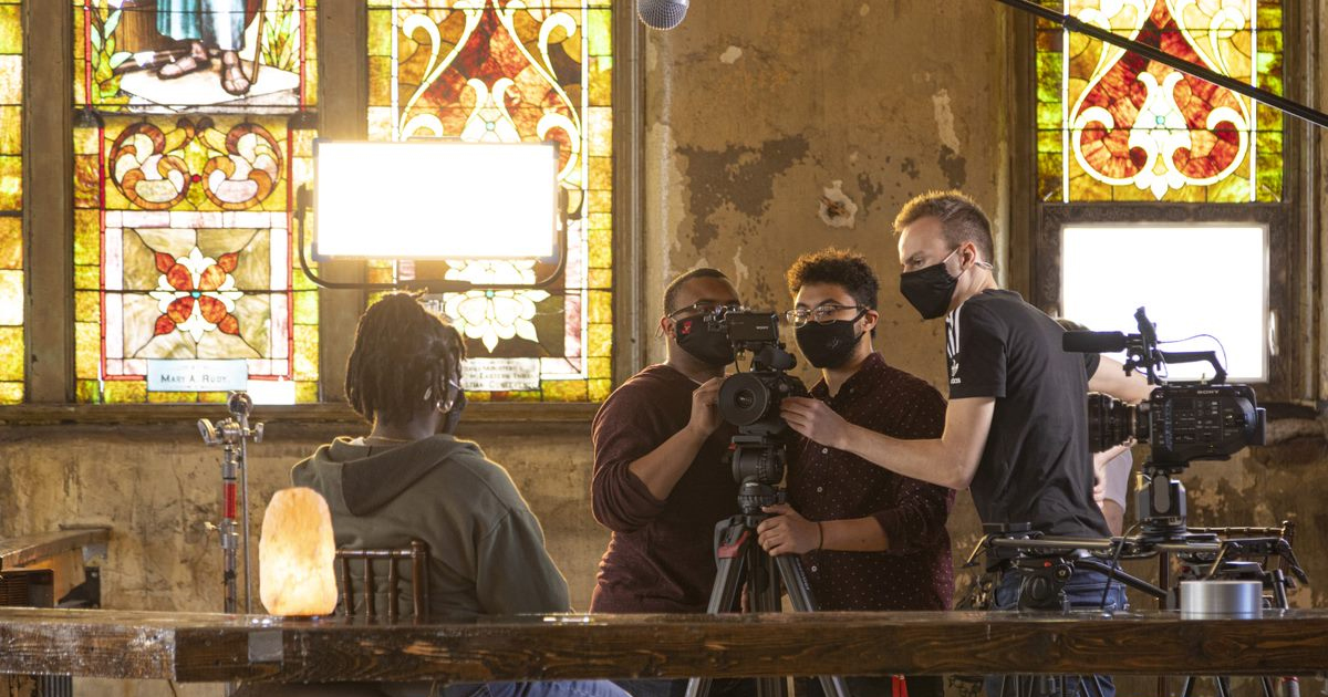 Students behind camera