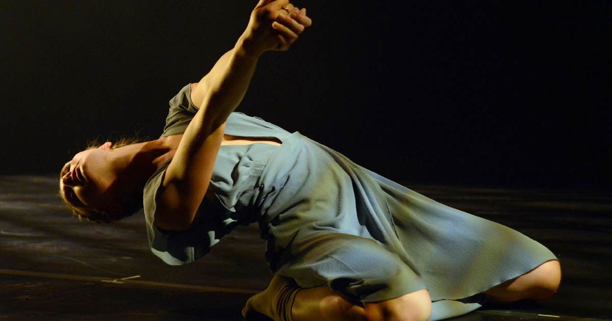 Ball State dance student performing on stage.