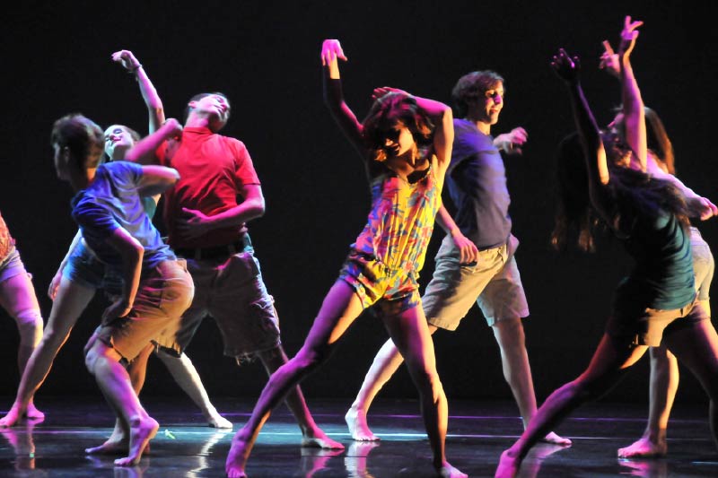 Ball state dance students performing on stage.