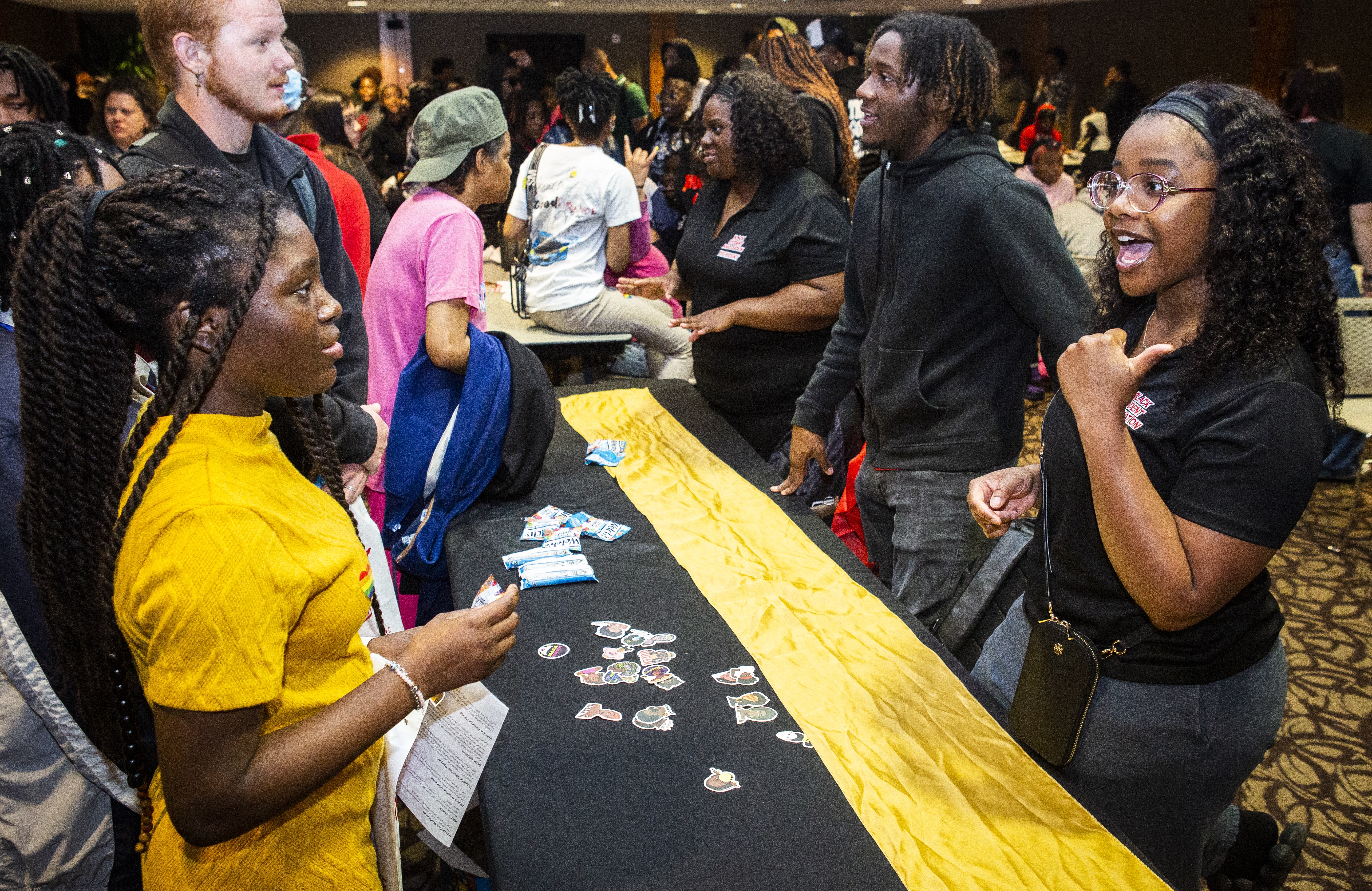 Prospective students speaking with Ball State representatives at the Explore BSU Day event