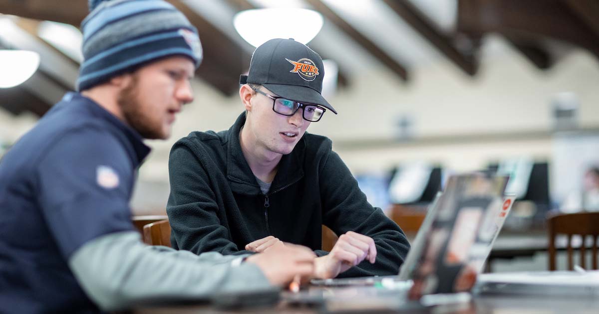 learning center tutor tutoring a student