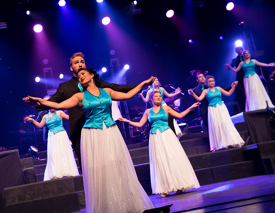 University Singers performing at Emens Auditorium