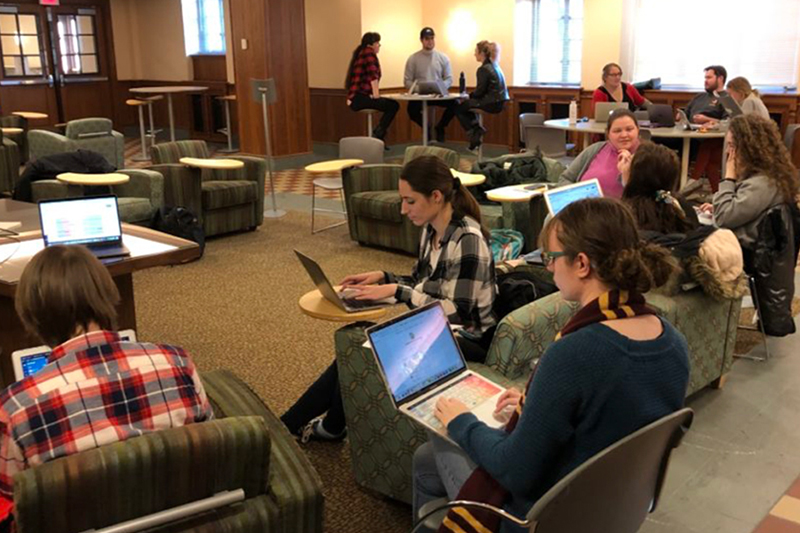 Students studying and socialize in North Quad