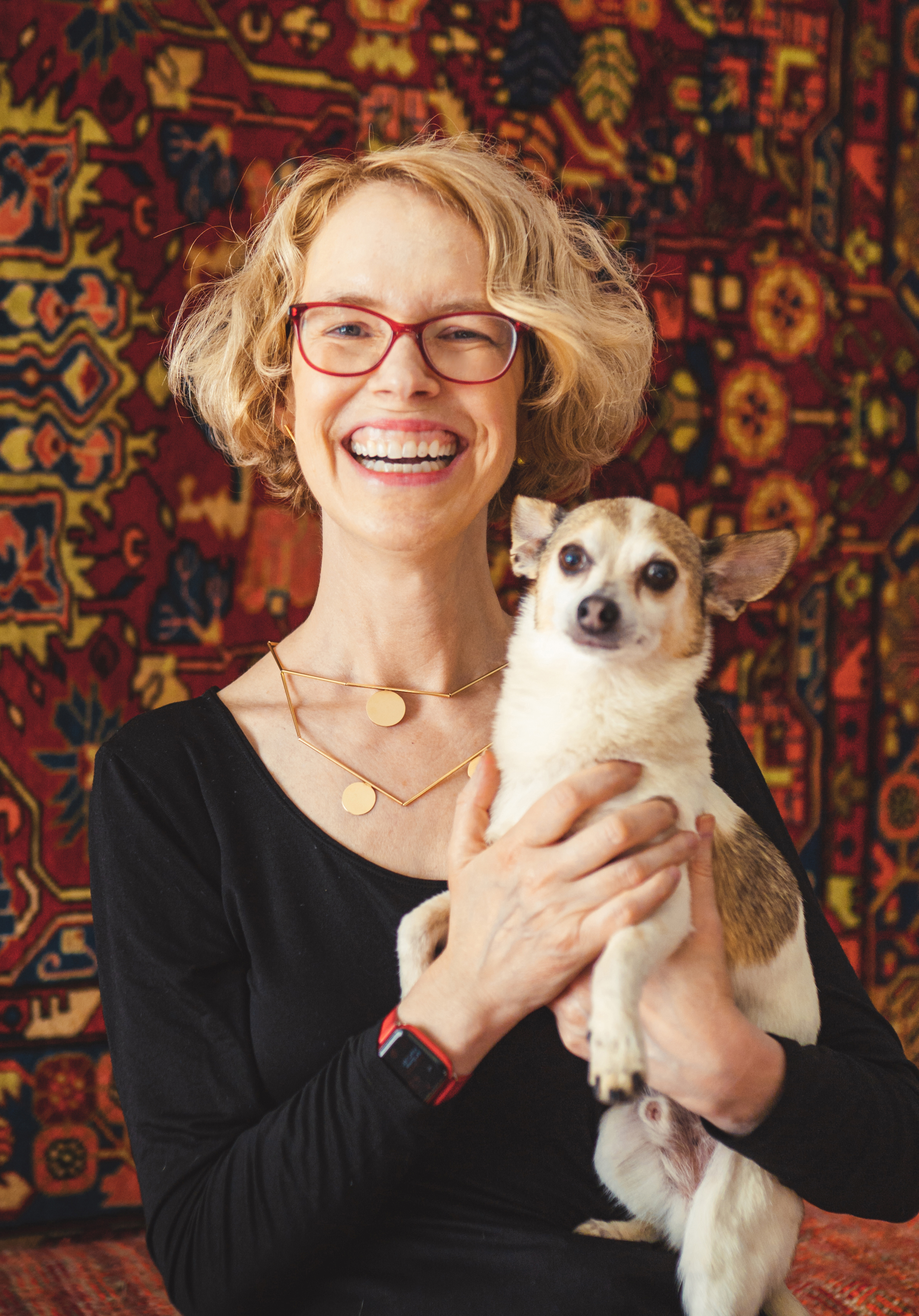 Graphic designer Ellen Lupton poses with her dog, Kevin.