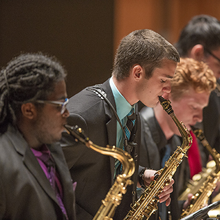 Jazz musicians on stage performing
