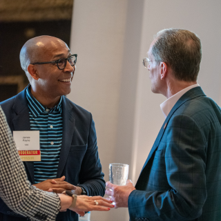 two people talking at the Cardinal Networking Forum from 2024