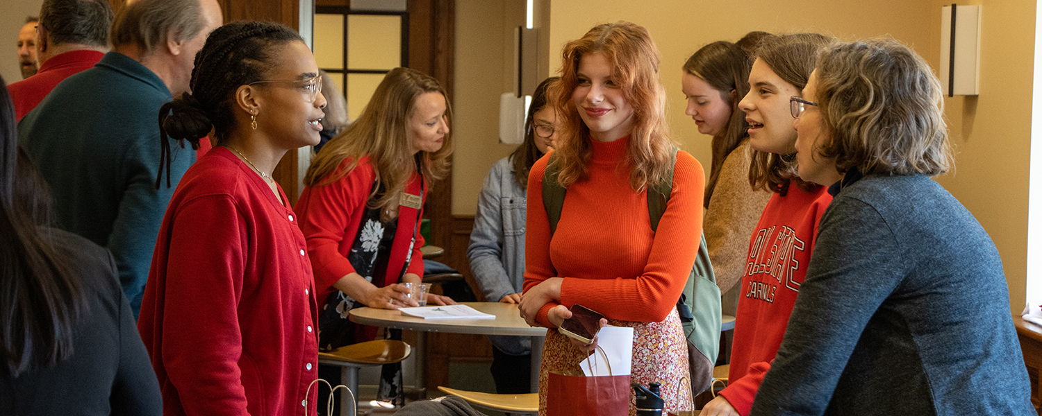 Students and Faculty talking