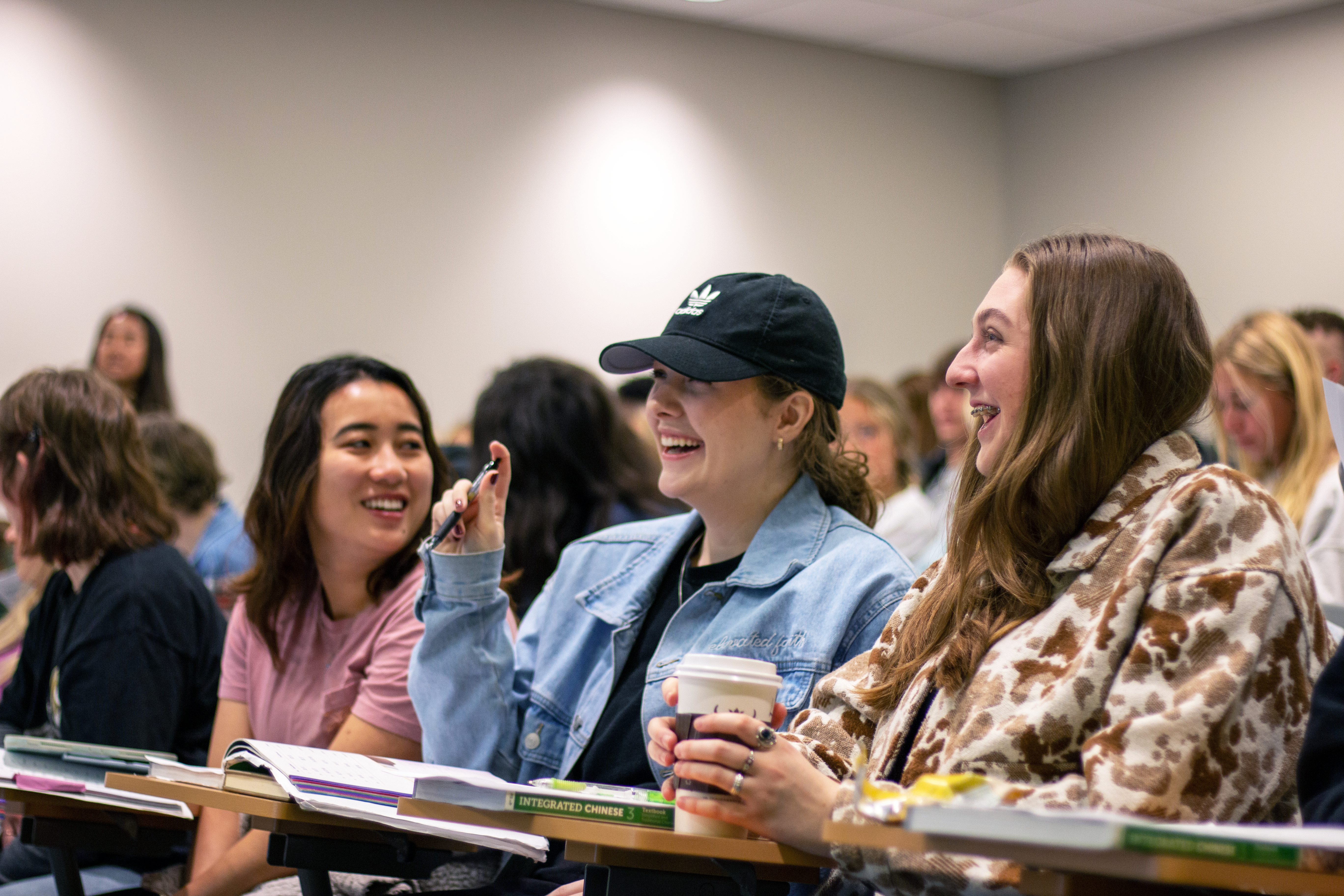Students laughing and engaged in a Ball State University classroom 