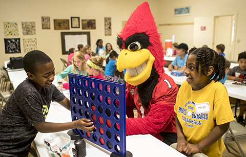 Charlie Cardinal with students at STEM summer camp