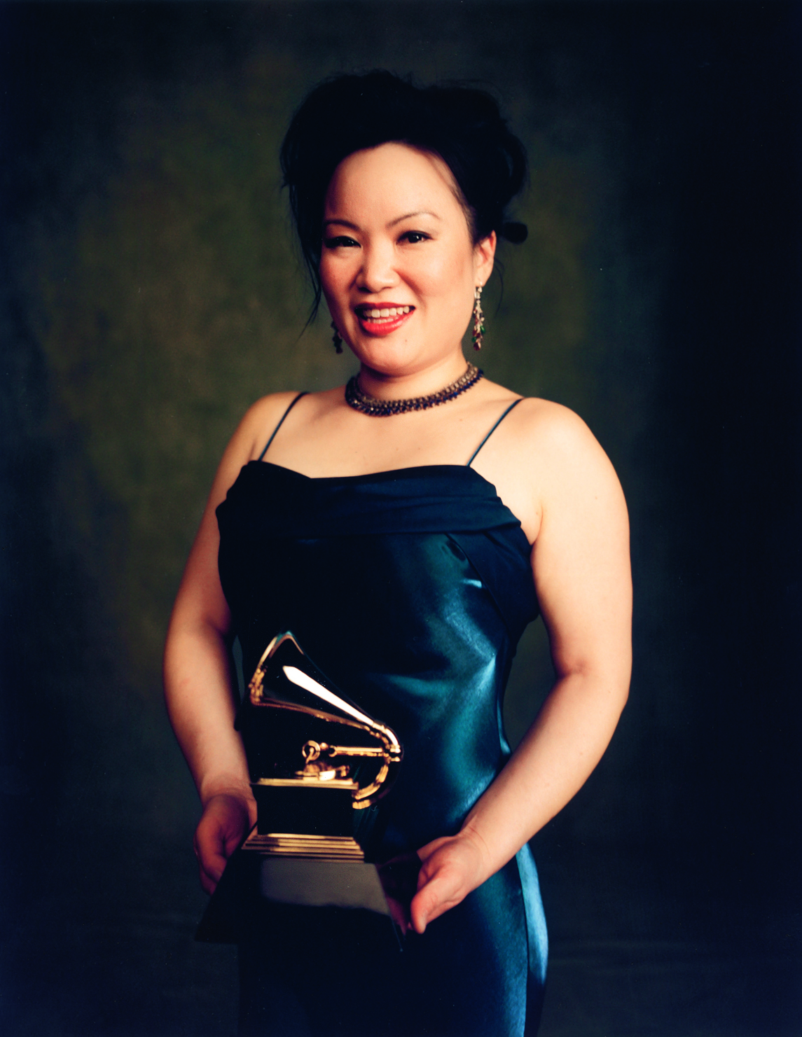 Angelin Chang holds GRAMMY award