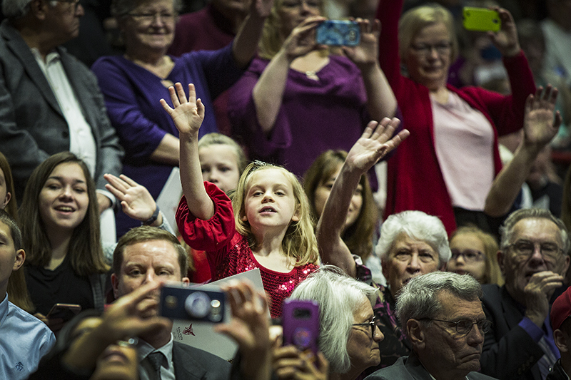 families waving to graduates at Fall Commencement 2018