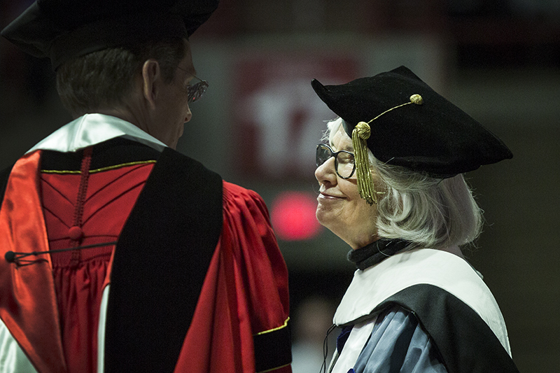 Shirley Briace Heath speaking to President Geoffrey S. Mearns at Fall Commencement 2018