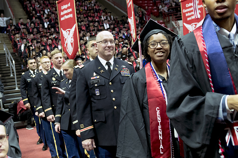 Emens Award winner Kathy Berryhill and ROTC at Spring Commencement 2019