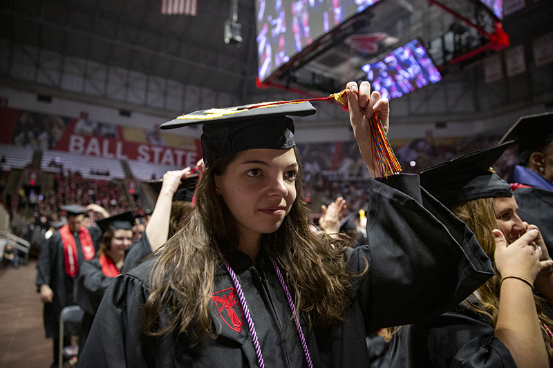 student moving tassel at Spring Commencement 2019