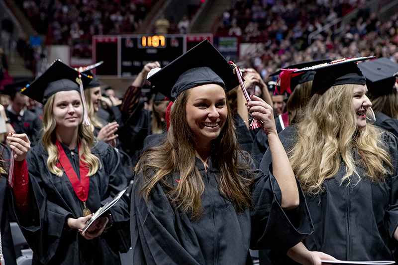 graduates turning tassels at Fall Commencement 2019
