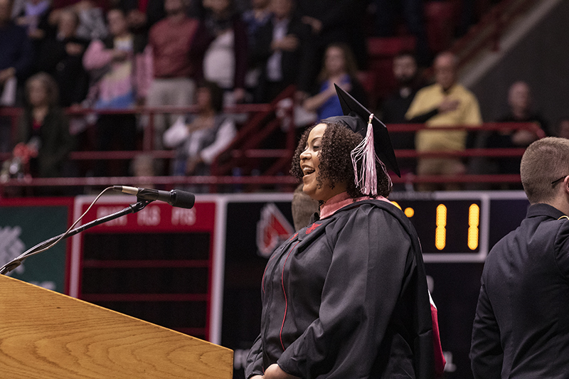 graduate singing at Fall Commencement 2019