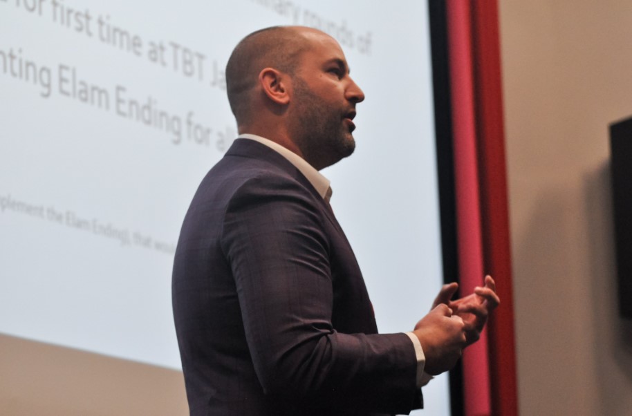 Elam delivering the keynote address "Elam Ending: Past, Present, and Future" at the 2019 Midwest Sports Analytics Meeting at Central College in Pella, IA.