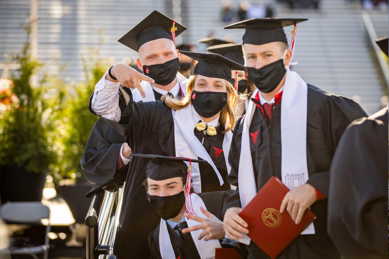 Group of graduates posing for picture
