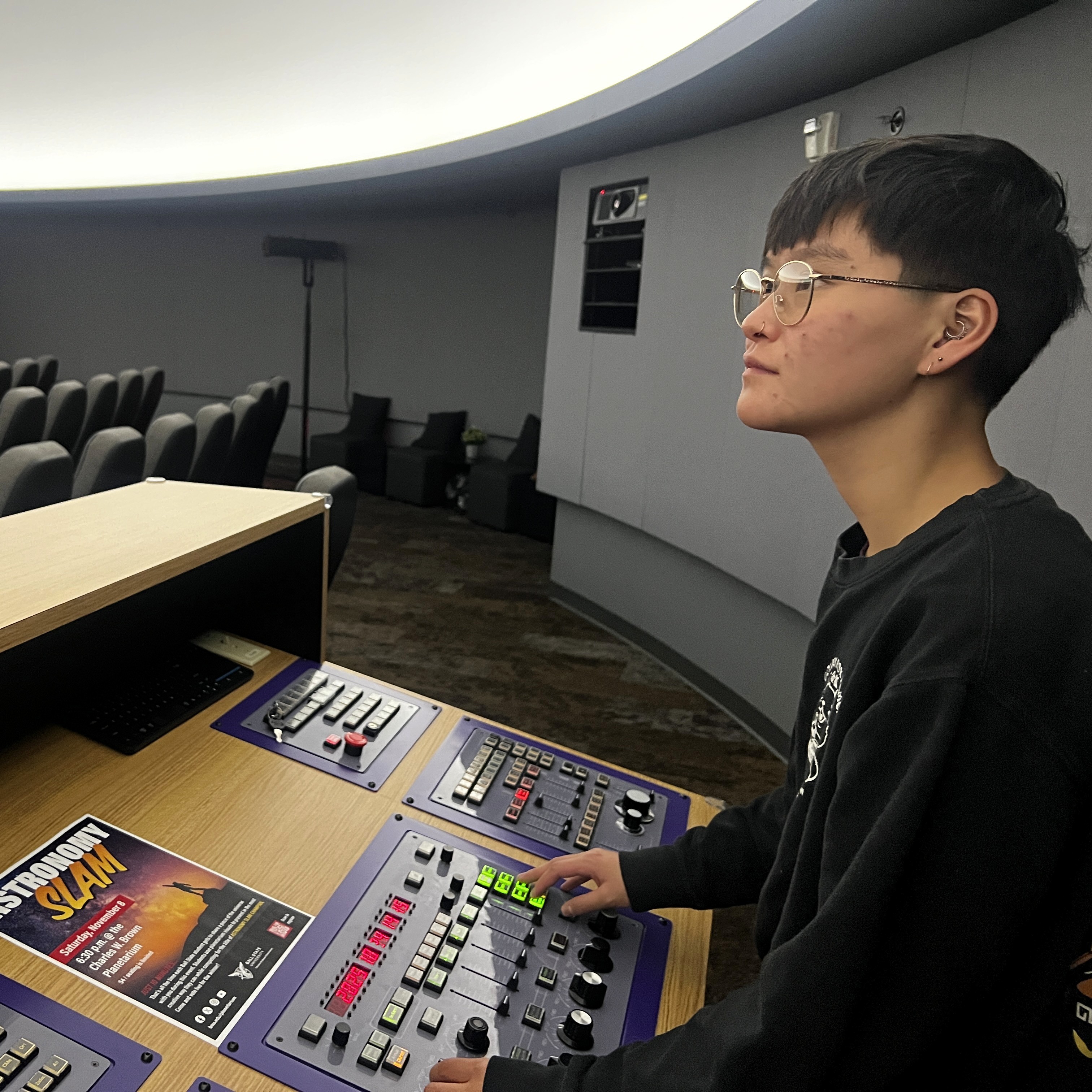 Kat at the planetarium controls
